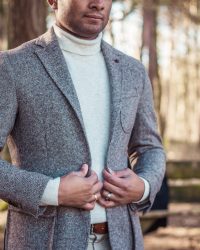person holding gray coat